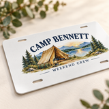 Illustrative printed surface and edge detail of one 12 x 6 inch decorative aluminum plate. CAMP BENNETT and WEEKEND CREW are personalized examples; mounting hardware and props not included. Not a vehicle registration plate.