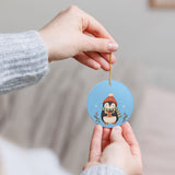 Cozy Winter Penguin Ceramic Ornament, Double Sided Round Christmas Decoration, Holiday Keepsake Gift — Product view — Photo 10