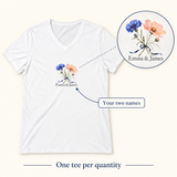 Illustrative two-name guide of one white personalized V-neck tee. Emma & James are examples; printed flowers are fixed; props not included.